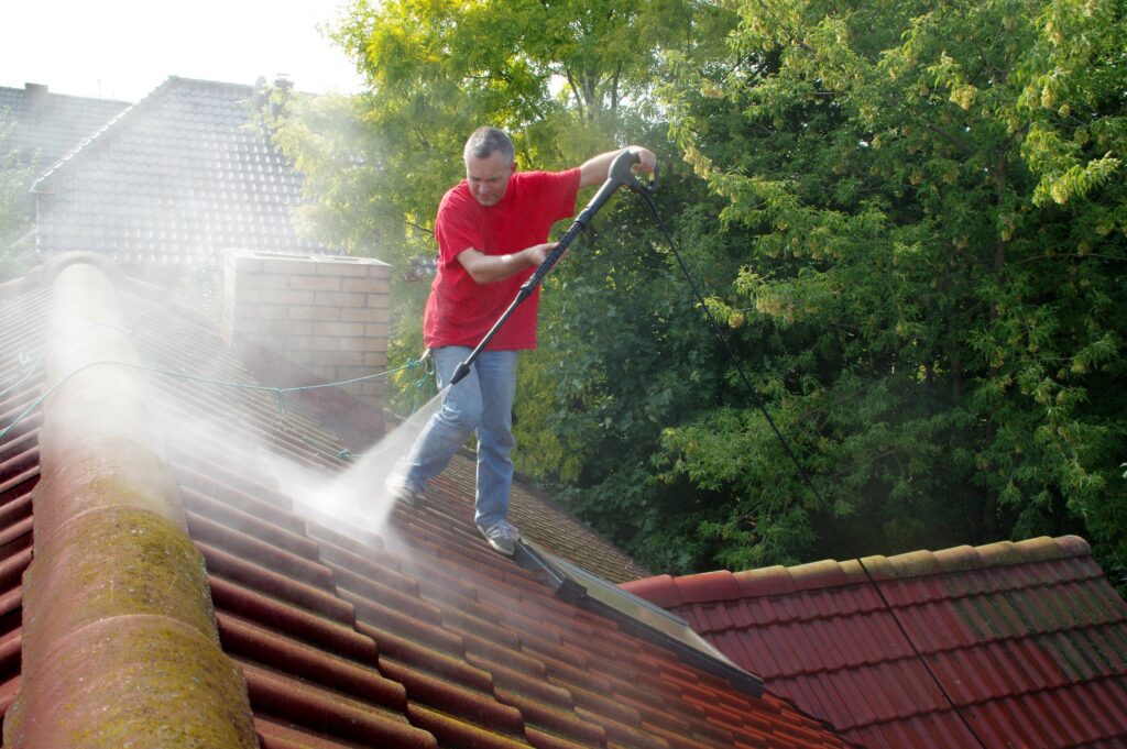 San Antonio roofing tips: cleaning with high pressure water. A problem with moss and lichen.