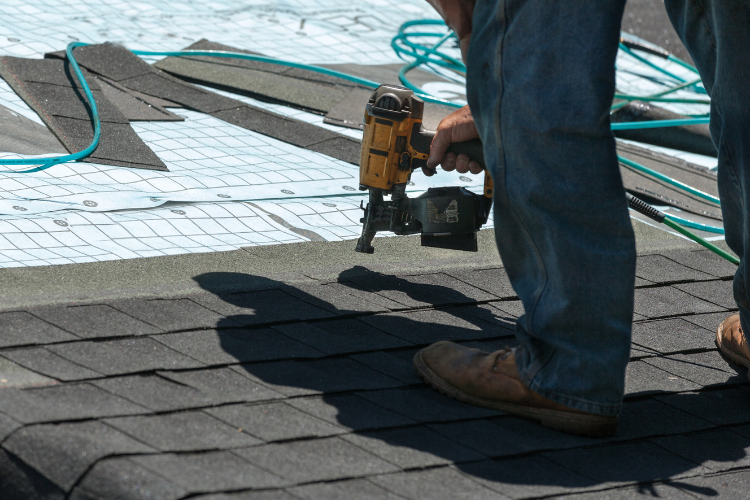 High-quality storm-resistant shingles being installed.
