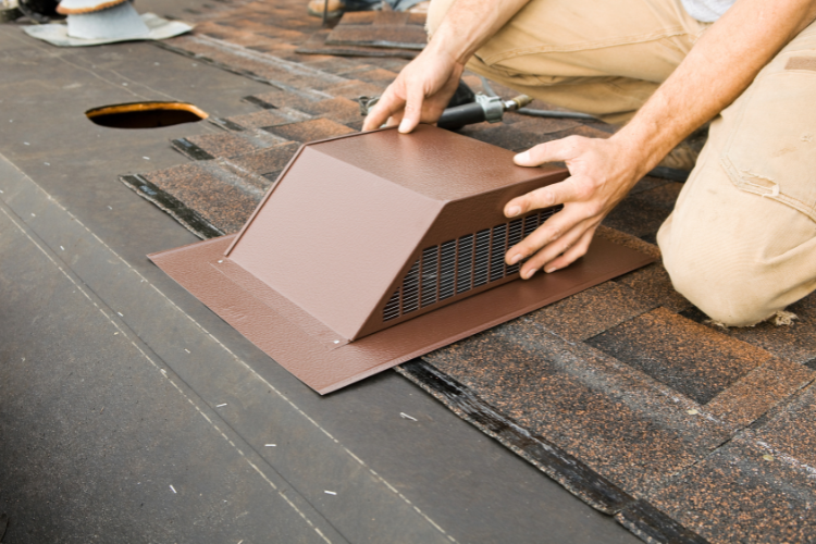 Attic ventilation system being installed by Rooftop Roofing and Remodeling.