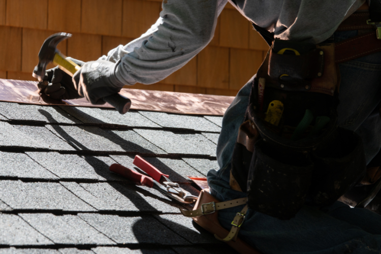 Rooftop Roofing and Remodeling team repairing storm damage in Selma, TX.