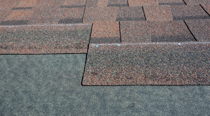 Roof Repair, Asphalt Shingles Roof Renovation . Close Up On Inst